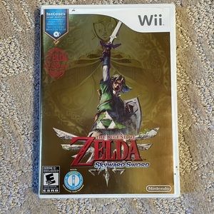 Skyward Sword on Wii in original case (symphony cd not included bc I love it)